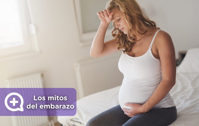 Mujer embarazada, con mareos, tomando medicación. remedios y mitos sobre el embarazo